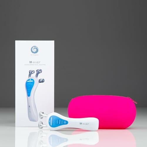 Beauty device with pink case and packaging.